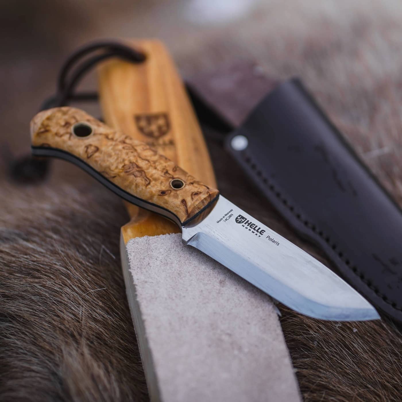Helle Polaris knife with leather sheath and paddle strop